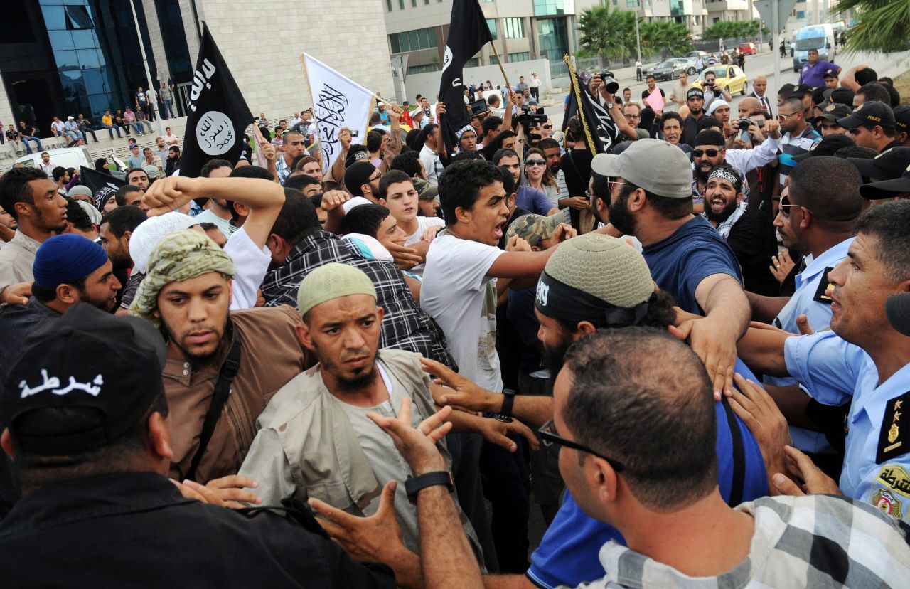 A group of protesters attend a demonstration outside the U.S. Embassy in Tunis on Wednesday.