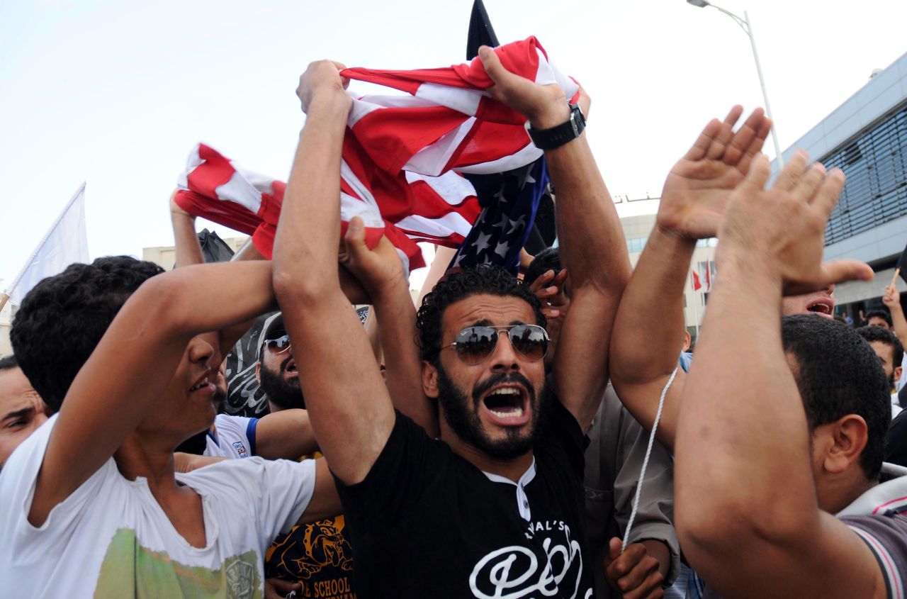 Protesters shout outside the U.S. Embassy in Tunis, Tunisia, on Wednesday, September 12. 