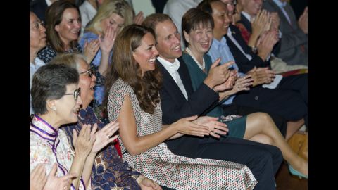 The duke and duchess applaud as they visit The Rainbow Centre.