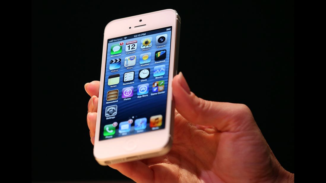 The iPhone 5 looks similar to previous models but has a larger screen and is lighter and thinner than the iPhone 4S.