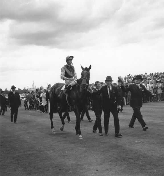 The last horse to win the Triple Crown was Nijinsky in 1970, seen here being led at Ascot by a different O'Brien -- legendary trainer Vincent.
