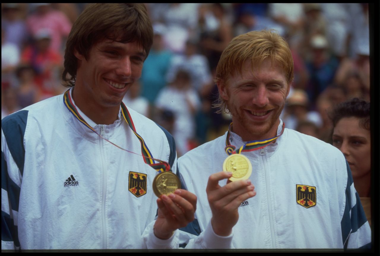 The smiles belie an intense rivalry as Michael Stich (left) and Boris Becker win gold for Germany at the 1992 Olympic Games in Barcelona.