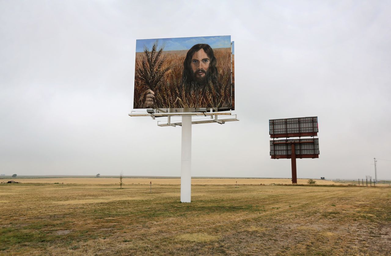  A billboard, "Jesus in the Wheat," stands alongside Interstate 70 on August 24 in Colby, Kansas. The billboard was erected by local residents Tuffy and Linda Taylor. "We just put it up there to minister," Linda Taylor told the Hays Daily News.