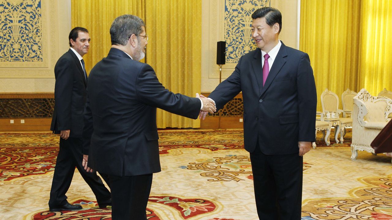 China's Xi Jinping (right) pictured on August 30 meeting Egyptian President Mohamed Morsi in Beijing.