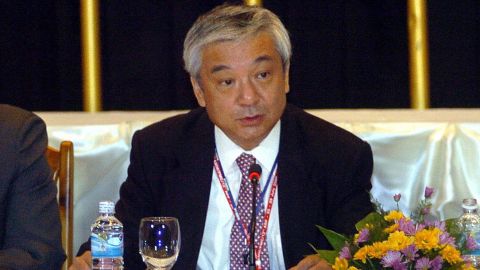 Shinichi Nishimiya (C) pictured in 2005 at a meeting of the  Association of Southeast Asian Nations (ASEAN).