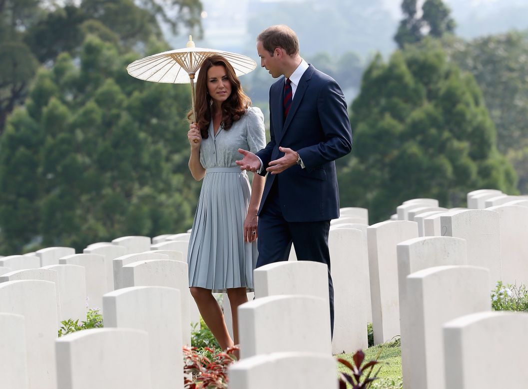 Catherine, Duchess of Cambridge, and Prince William, Duke of Cambridge, visit Kranji War Cemetery Thursday in Singapore.