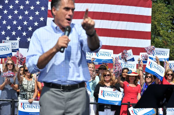 Supporters cheer as Romney speaks at a campaign rally in Fairfax, Virginia, on Thursday.