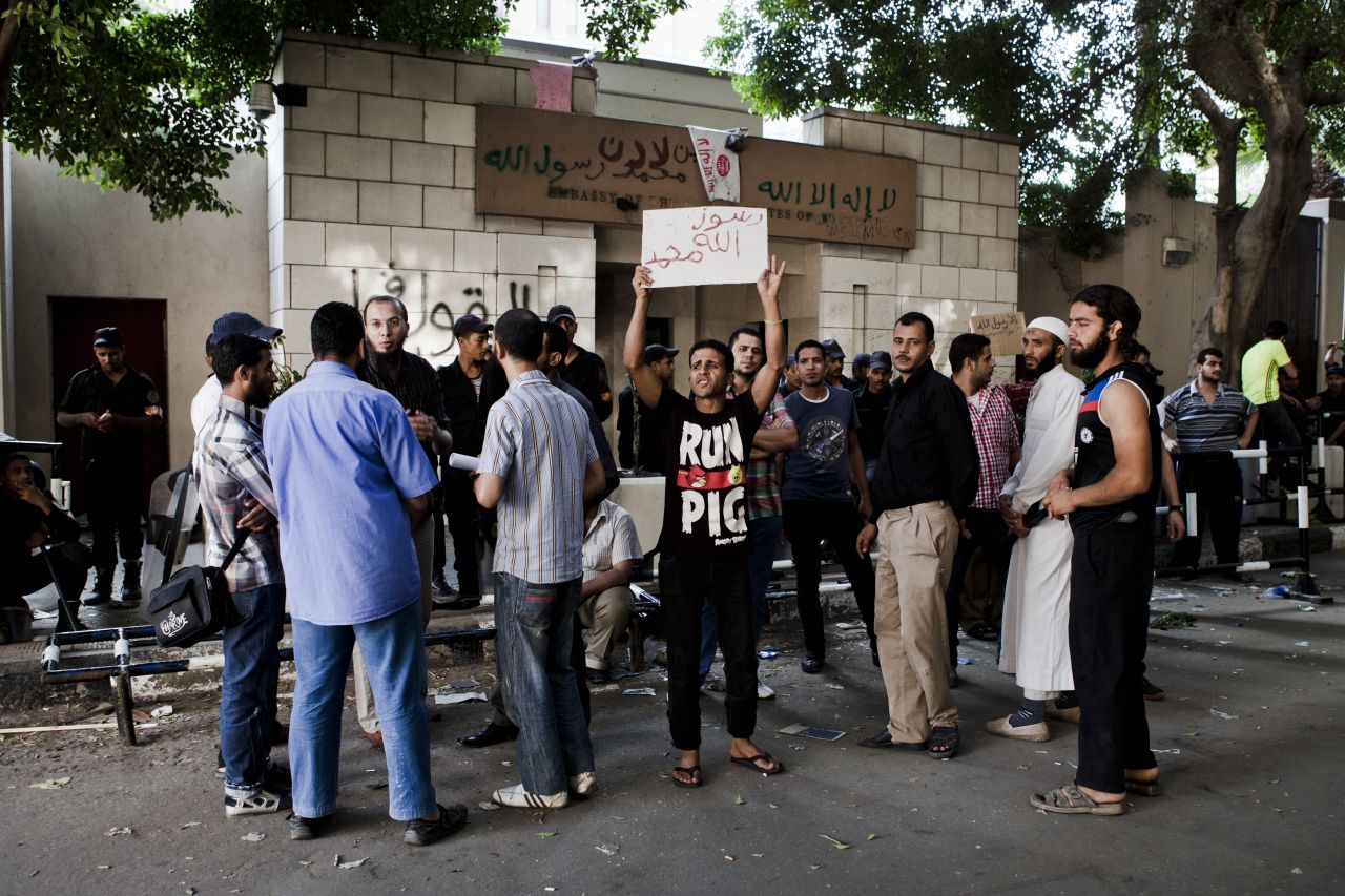 Egyptian protesters gather in front of the U.S. Embassy the morning after it was vandalized by protesters during a demonstration on Wednesday in Cairo.