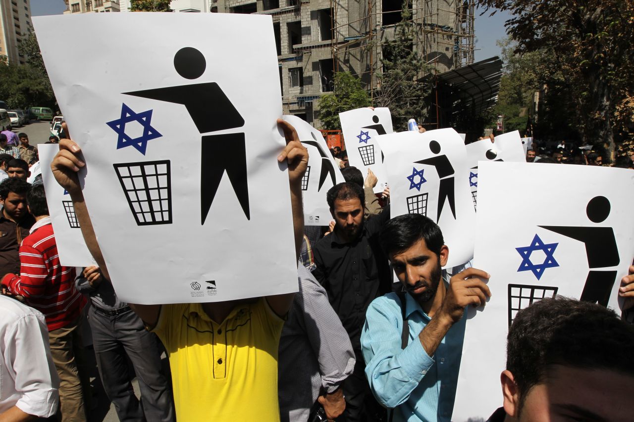 Iranians protest against a film mocking Islam near the Swiss Embassy in Tehran on Thursday. Up to 500 people chanted "Death to America!" and death to the director of the movie, which was made in the United States. The demonstration ended peacefully in two hours.