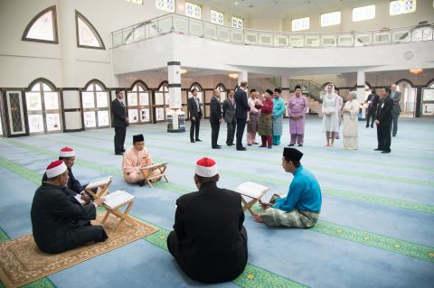 The royal couple visits Assyakirin Mosque in Kuala Lumpur, Malaysia, on Friday.