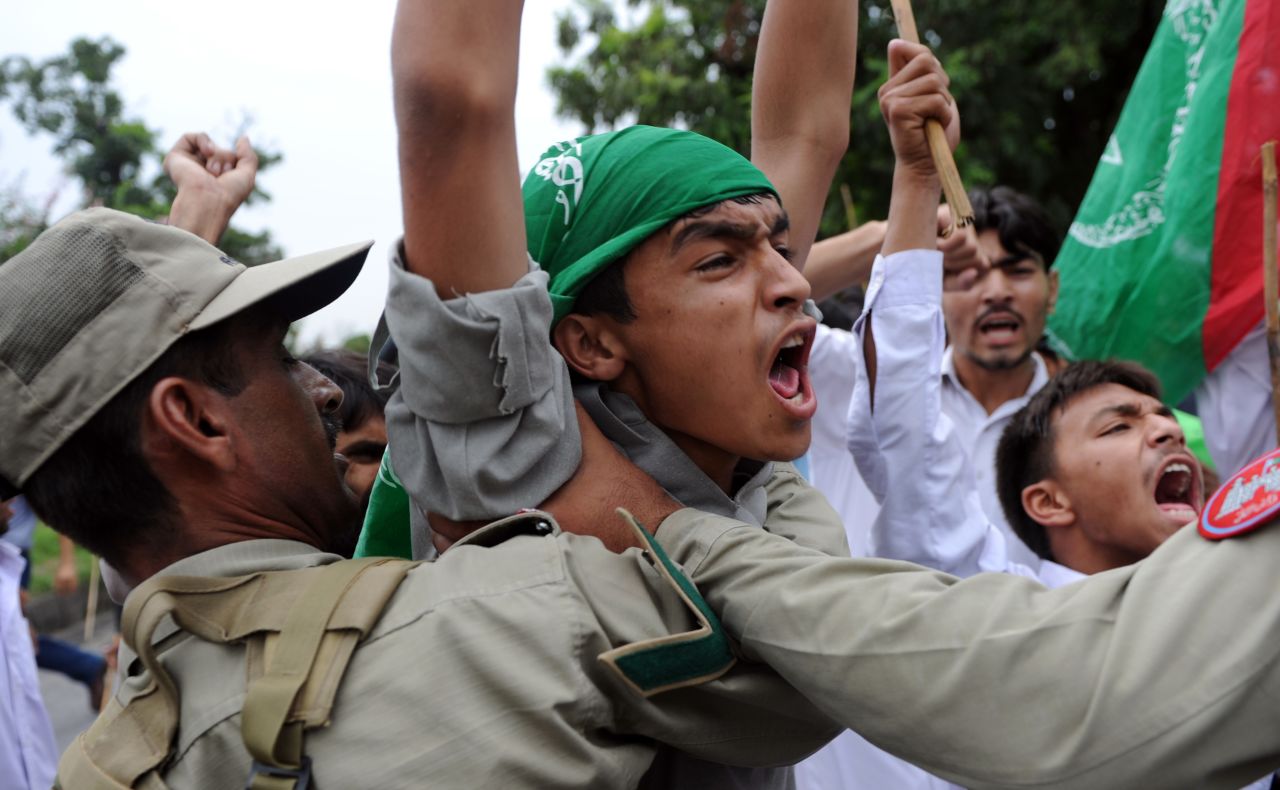 Muslim protesters shout outside the U.S. Embassy in Islamabad, Pakistan, on Friday.