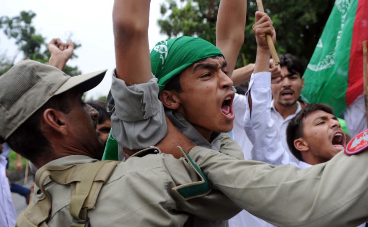 Muslim protesters shout outside the U.S. Embassy in Islamabad, Pakistan, on Friday.