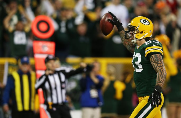 Tight end Tom Crabtree celebrates his second quarter touchdown Thursday against the Chicago Bears.