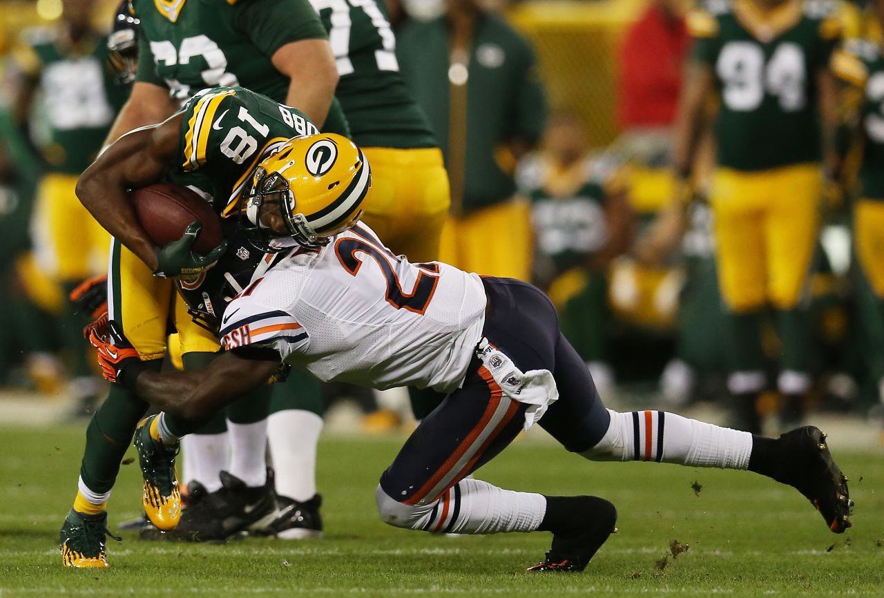 Major Wright of the Chicago Bears tackles wide receiver Randall Cobb of the Green Bay Packers on Thursday.