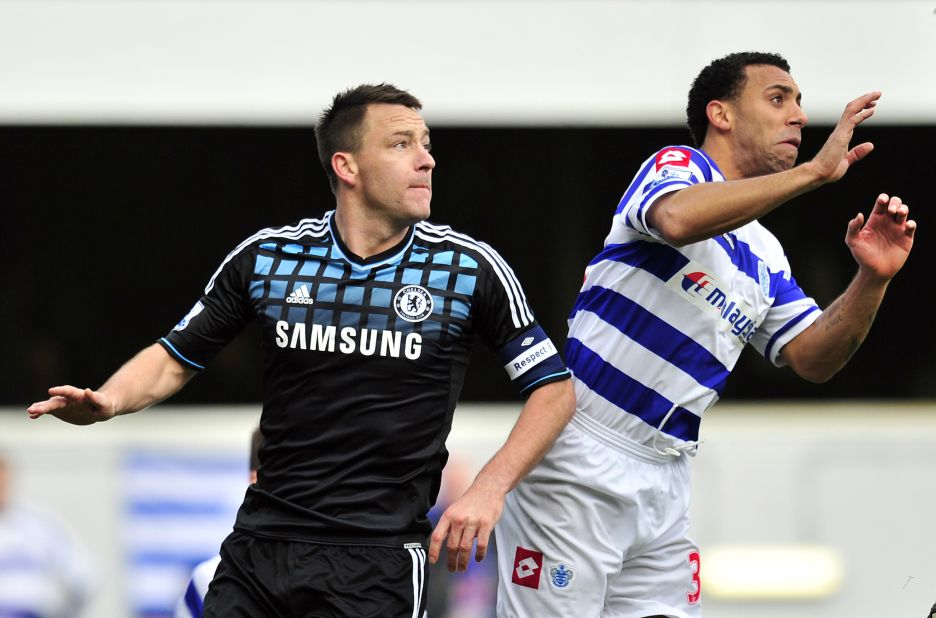 Chelsea's John Terry (L) was found not guilty in a criminal court of racially abusing Queens Park Rangers defender Anton Ferdinand but received a four-match ban from the FA and a $356,000 fine for calling his opponent a "f*****g black c***."