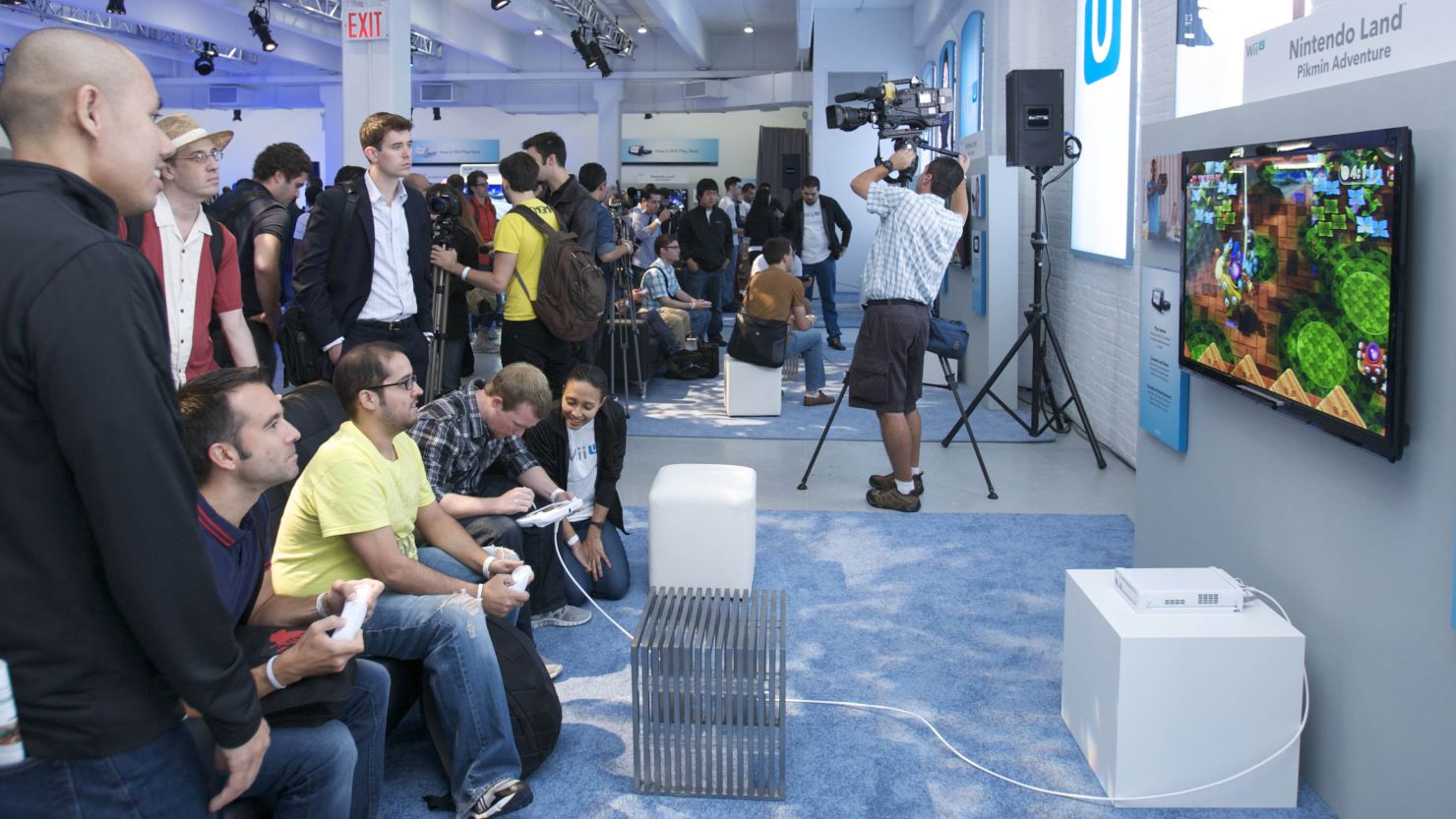 Members of the gaming media play "Nintendo Land" at a press event for the Nintendo Wii U on Thursday.