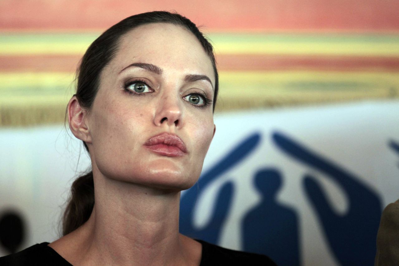 Jolie briefs the press during her visit to the Za'atri camp near Jordan's border with Syria on Tuesday.