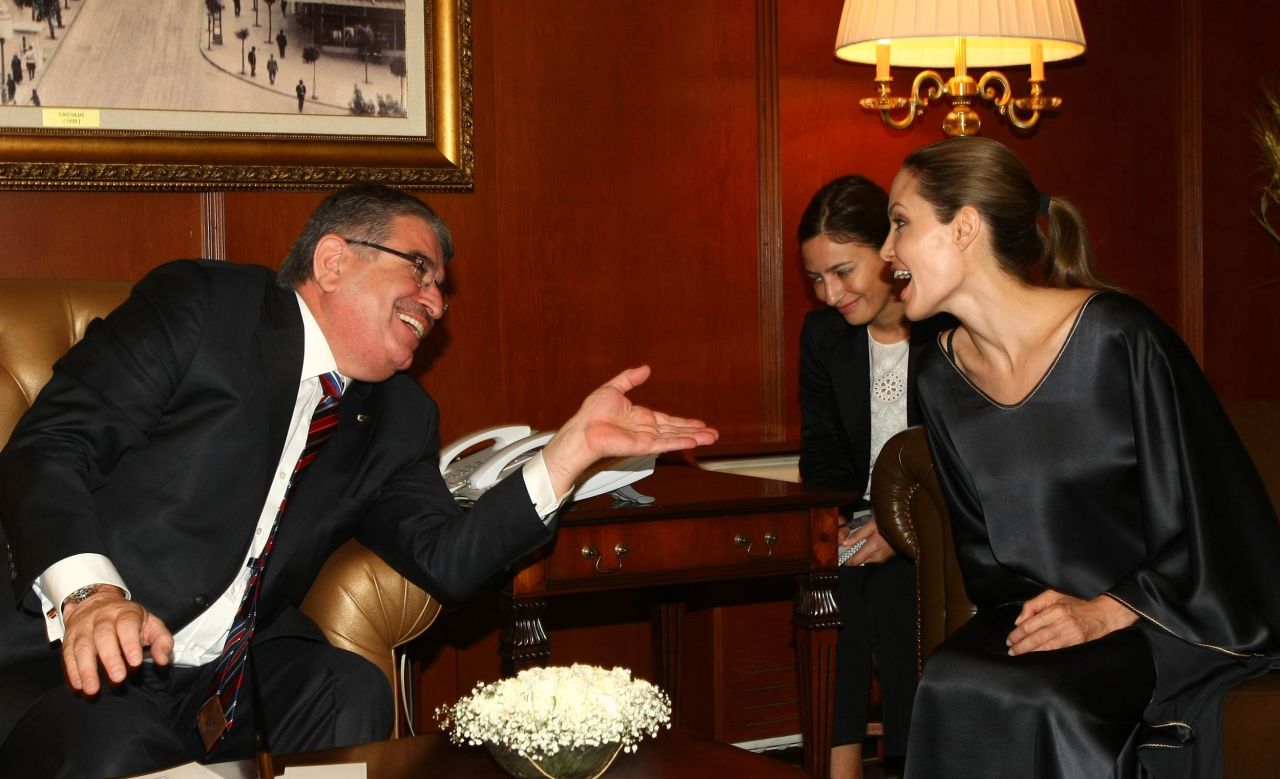Jolie meets with Turkish Interior Minister Idris Naim Sahin in Ankara on Thursday. About 80,000 refugees are encamped in southeastern Turkey, near the Syrian border.