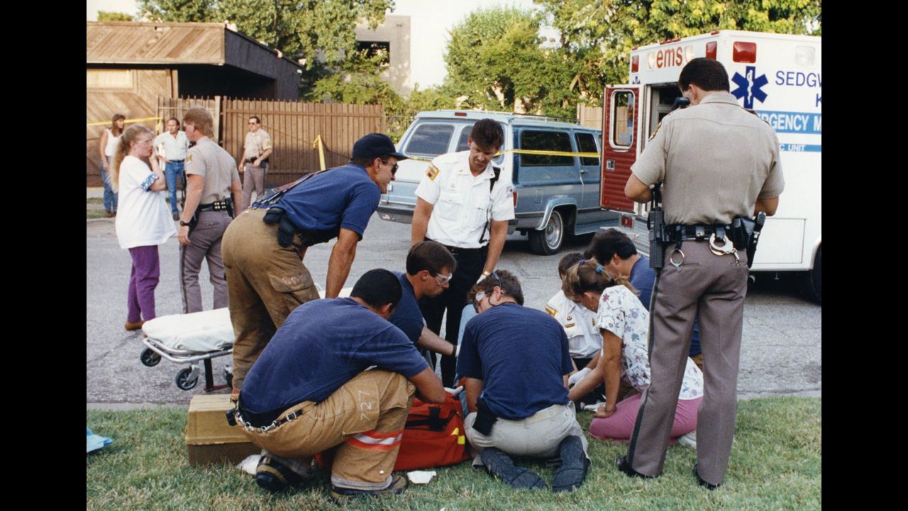 Pararmedics work on George Tiller after he was shot outside his clinic in 1993.