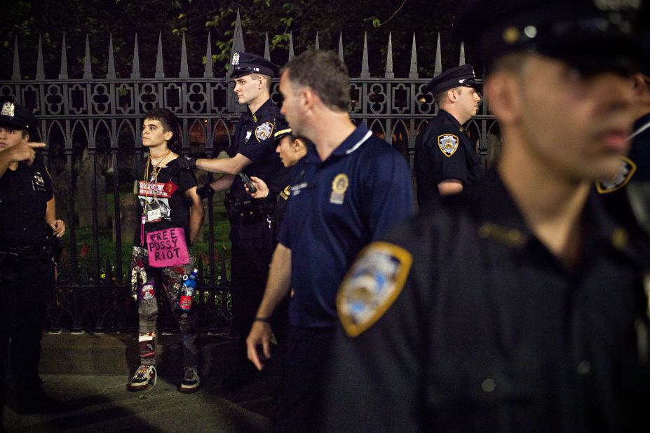 An Occupy Wall Street protester is arrested by police on Broadway after a march from Washington Square Park to New York's financial district on Saturday, September 15.