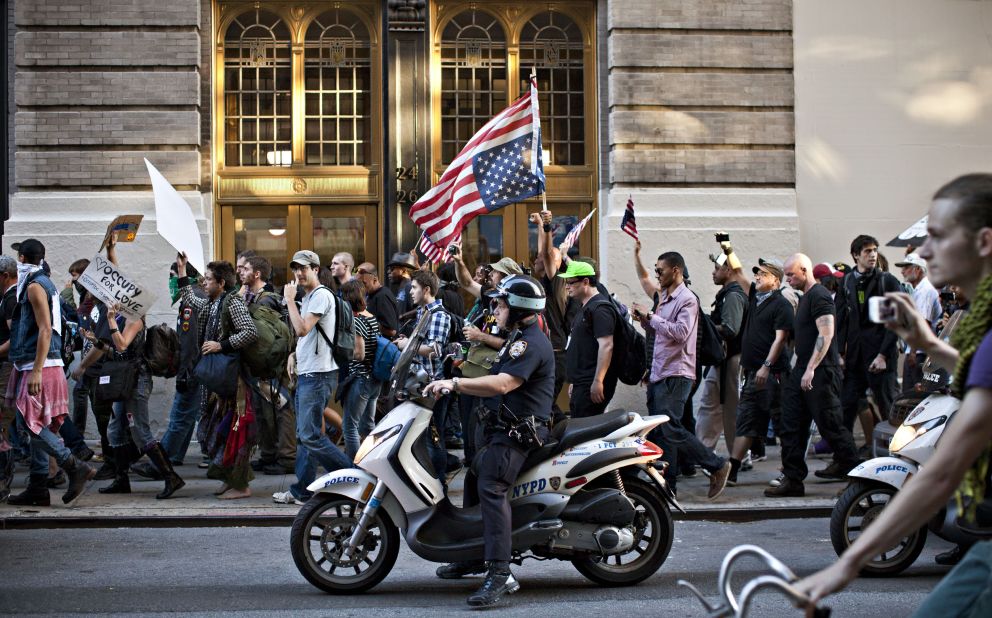 Members of Occupy Wall Street march from Washington Square Park to New York's financial district on Saturday.