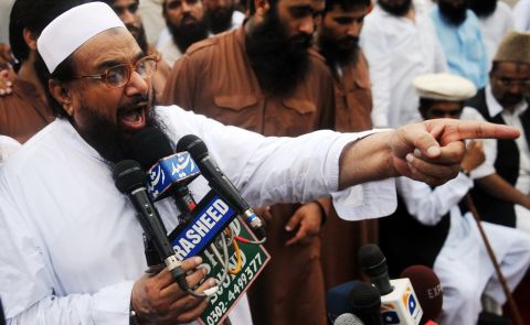Hafiz Mohammad Saeed, head of Pakistan's outlawed Islamic hard-line group Jamaat ud Dawa, addresses supporters in Lahore on Sunday.