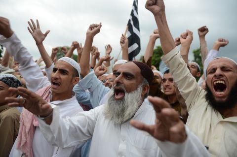 Pakistani activists shout slogans in Islamabad on Sunday, September 16.