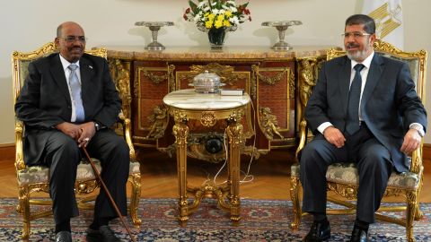 Sudanese President Omar al-Bashir, left, meets with Egyptian President Mohamed Morsy, in Cairo, Egypt.