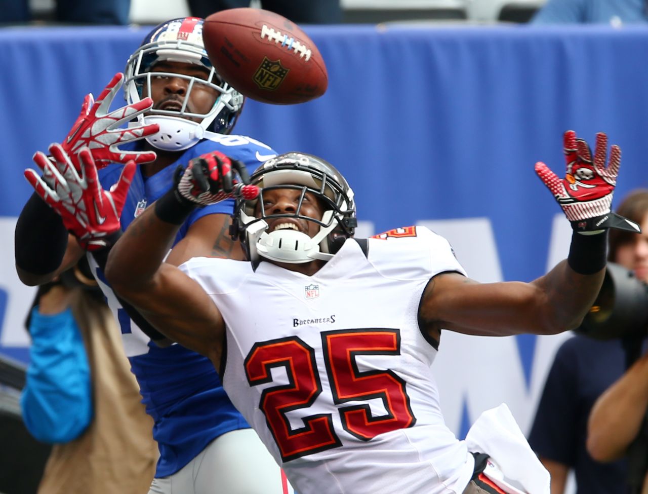 Aqib Talib of the Tampa Bay Buccaneers breaks up a pass intended for Hakeem Nicks of the New York Giants in the first half on Sunday.