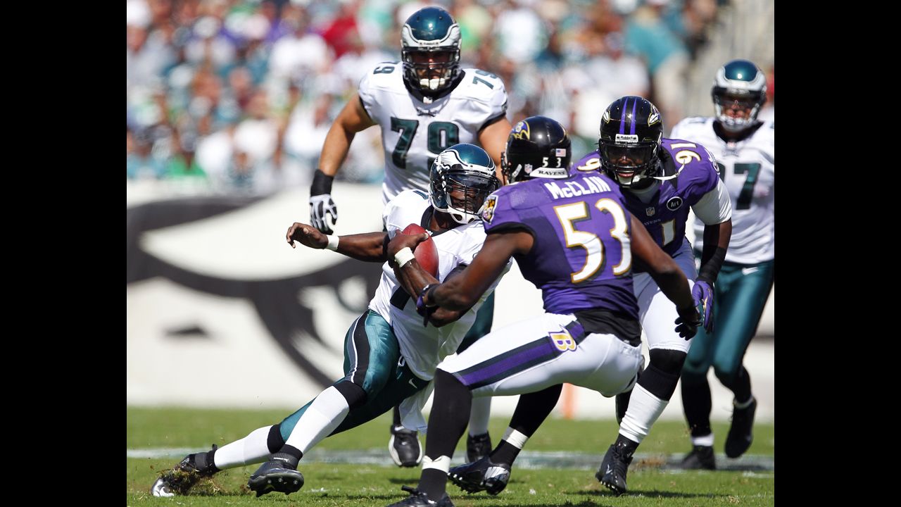 Quarterback Michael Vick of the Philadelphia Eagles runs for a six-yard gain against the Baltimore Ravens on Sunday at Lincoln Financial Field in Philadelphia.
