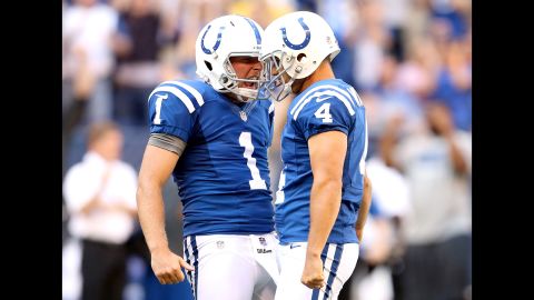 Pat McAfee, left, and Adam Vinatieri of the Indianapolis Colts celebrate after Vinatieri made the game-winning 53-yard field goal on Sunday against the Minnesota Vikings.