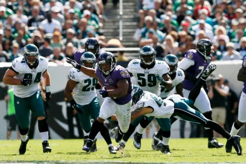Running back Ray Rice of the Baltimore Ravens rushes for a long gain against the Philadelphia Eagles during the first half Sunday.