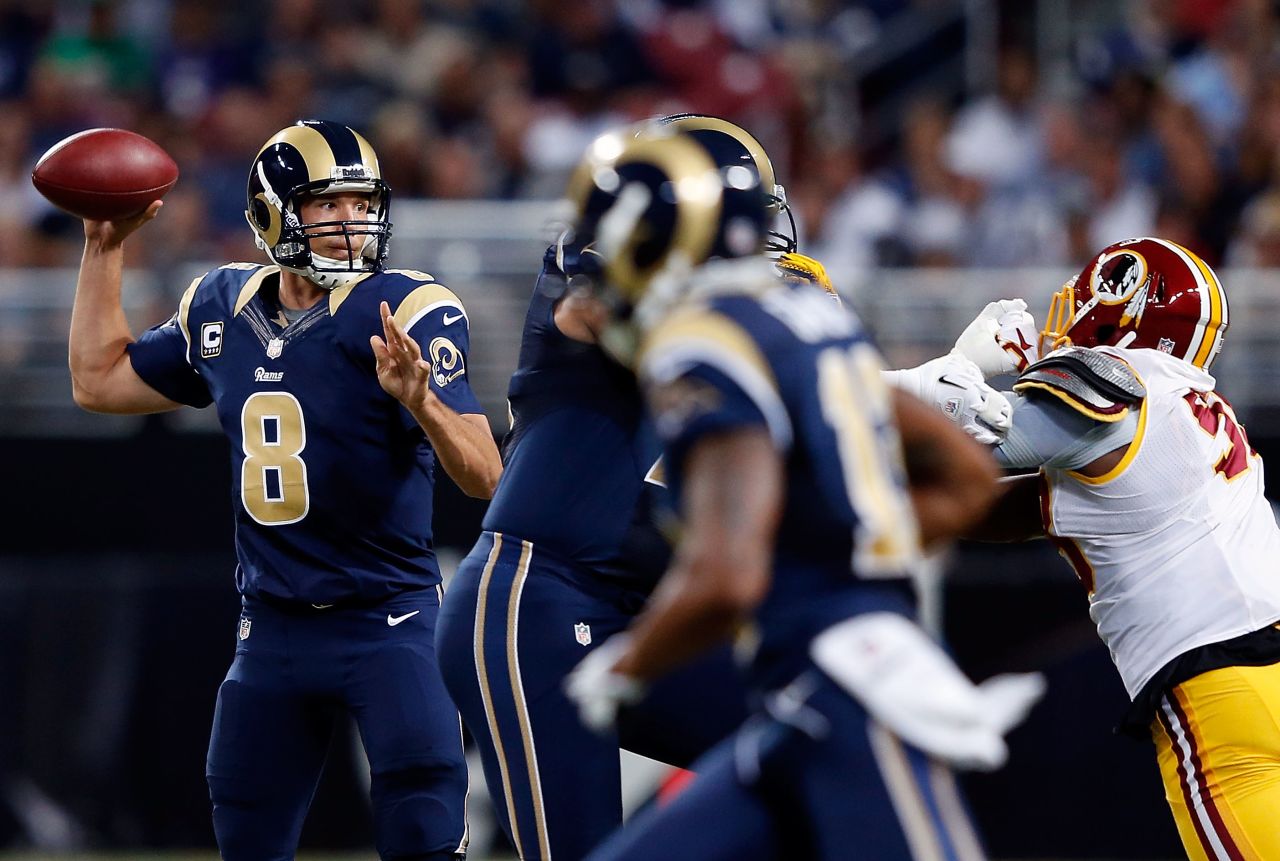 Quarterback Sam Bradford of the St. Louis Rams passes during Sunday's game against the Washington Redskins.