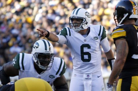 Mark Sanchez of the New York Jets directs the offense in Sunday's game against the Pittsburgh Steelers.