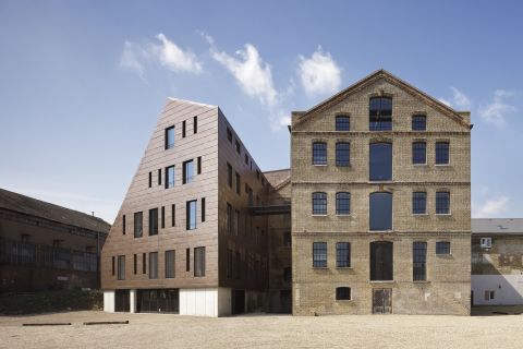 Scattered across the breadth of London, the 750 Open House venues represent a cross-section of the city's architectural heritage, from timber-framed Tudor dwellings to the latest steel-clad contemporary towers. This restoration of a five-storey Victorian granary with its adjacent bronze-coated extension is a neat embodiment of both old and new.  