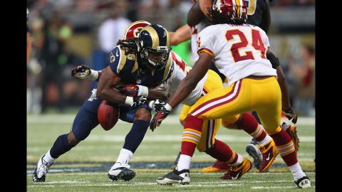 Daryl Richardson of the St. Louis Rams fumbles the ball against the Washington Redskins on Sunday.