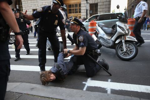 A protester is arrested during the one-year anniversary of the Occupy Wall Street movement on Monday.