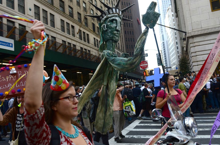 Participants in Occupy Wall Street take part in a rally to mark the one-year anniversary of the movement on Monday.