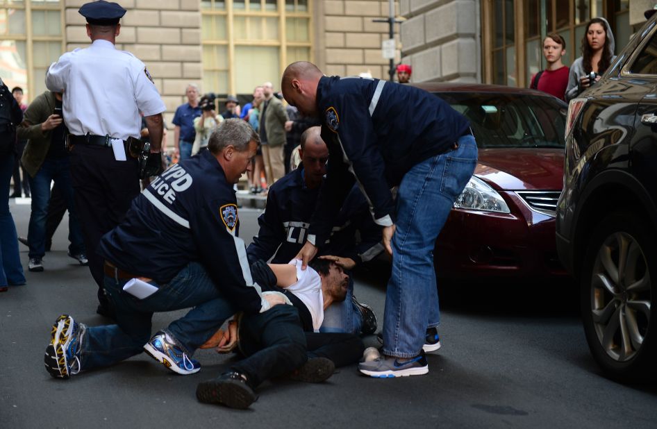 An Occupy Wall Street participant is arrested by police on Monday.