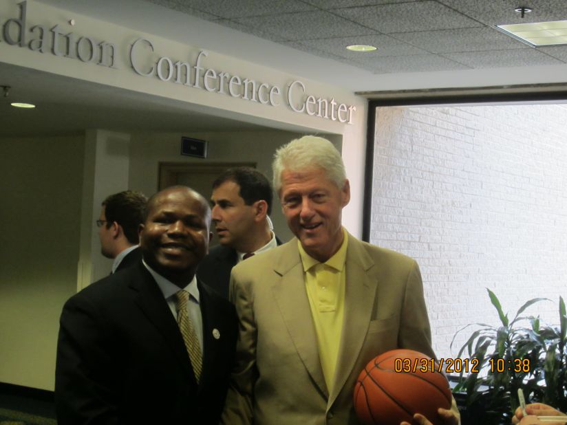 Bello, pictured here with former U.S. president Bill Clinton, took part in the 2012 Clinton Global Initiative University.   