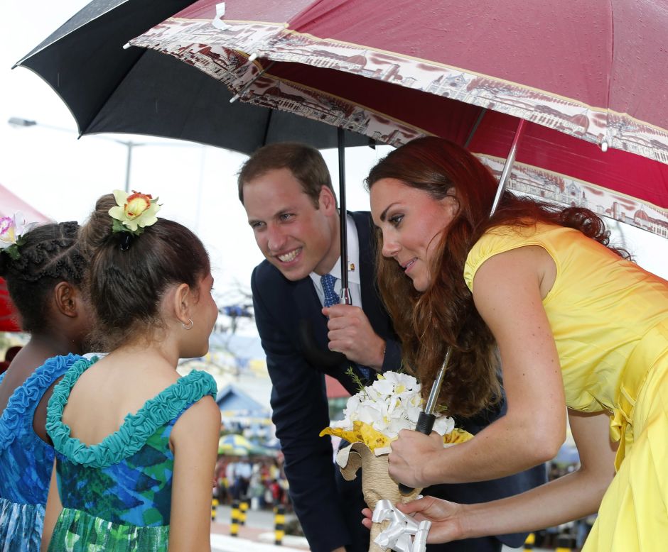 Prince William and Catherine, Duchess of Cambridge, meet young well-wishers during a visit to the Coast Watcher and Solomon Scouts Memorial on Day Seven of their Diamond Jubilee Tour in Honiara, Solomon Islands, on Monday.