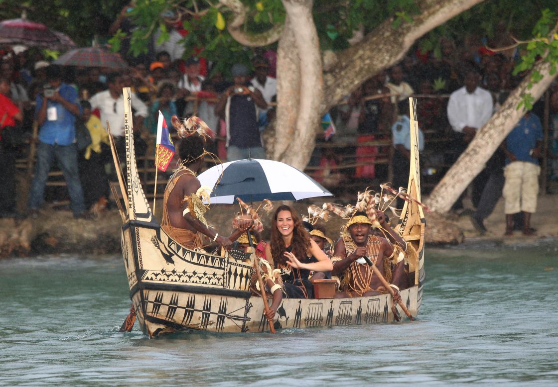 Catherine, Duchess of Cambridge, and Prince William travel in a traditional canoe during a visit to Tuvanipupu Island in the Solomon Islands on Monday.