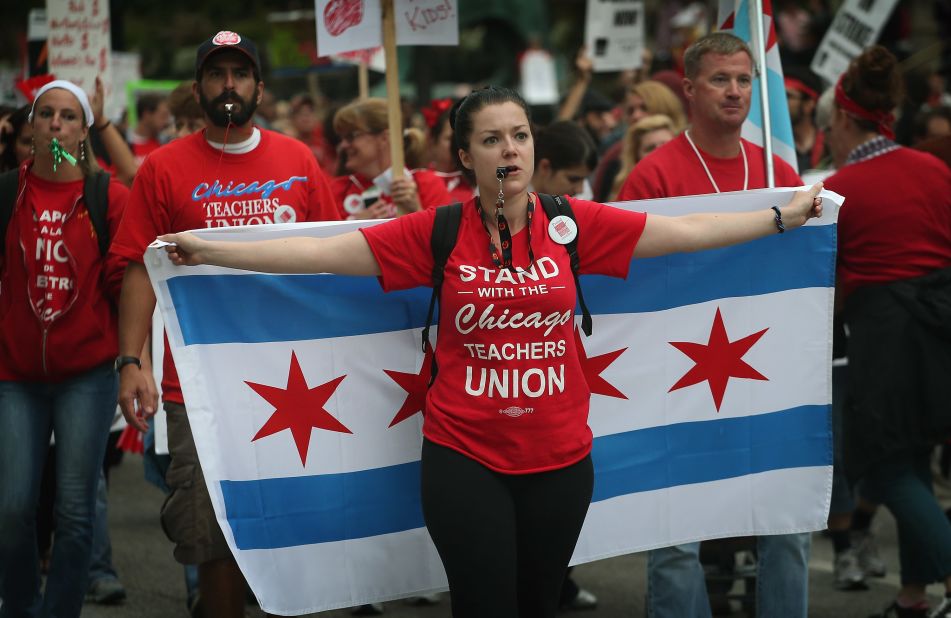 Striking teachers and their supporters march down Michigan Avenue on Thursday, September 13.