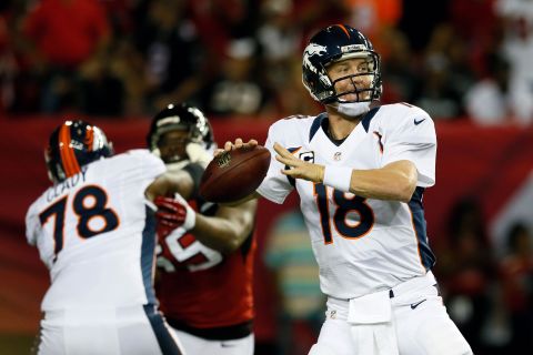 Peyton Manning of the Denver Broncos looks to pass in Monday's game against the Atlanta Falcons.