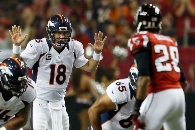 Quarterback Peyton Manning of the Denver Broncos gets ready to start a play during Monday's game against the Atlanta Falcons.