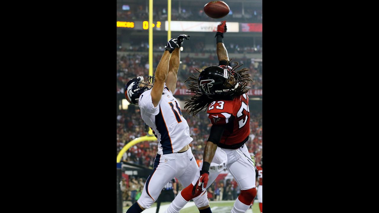 Dunta Robinson of the Atlanta Falcons breaks up a pass intended for Brandon Stokley of the Denver Broncos in the end zone on Monday.