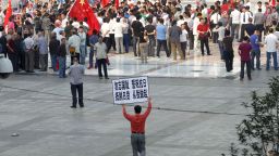 Chinese demonstrators protest on the streets in Zhengzhou, Henan province, on September 18, carrying on anti-Japanese rallies from the weekend.
