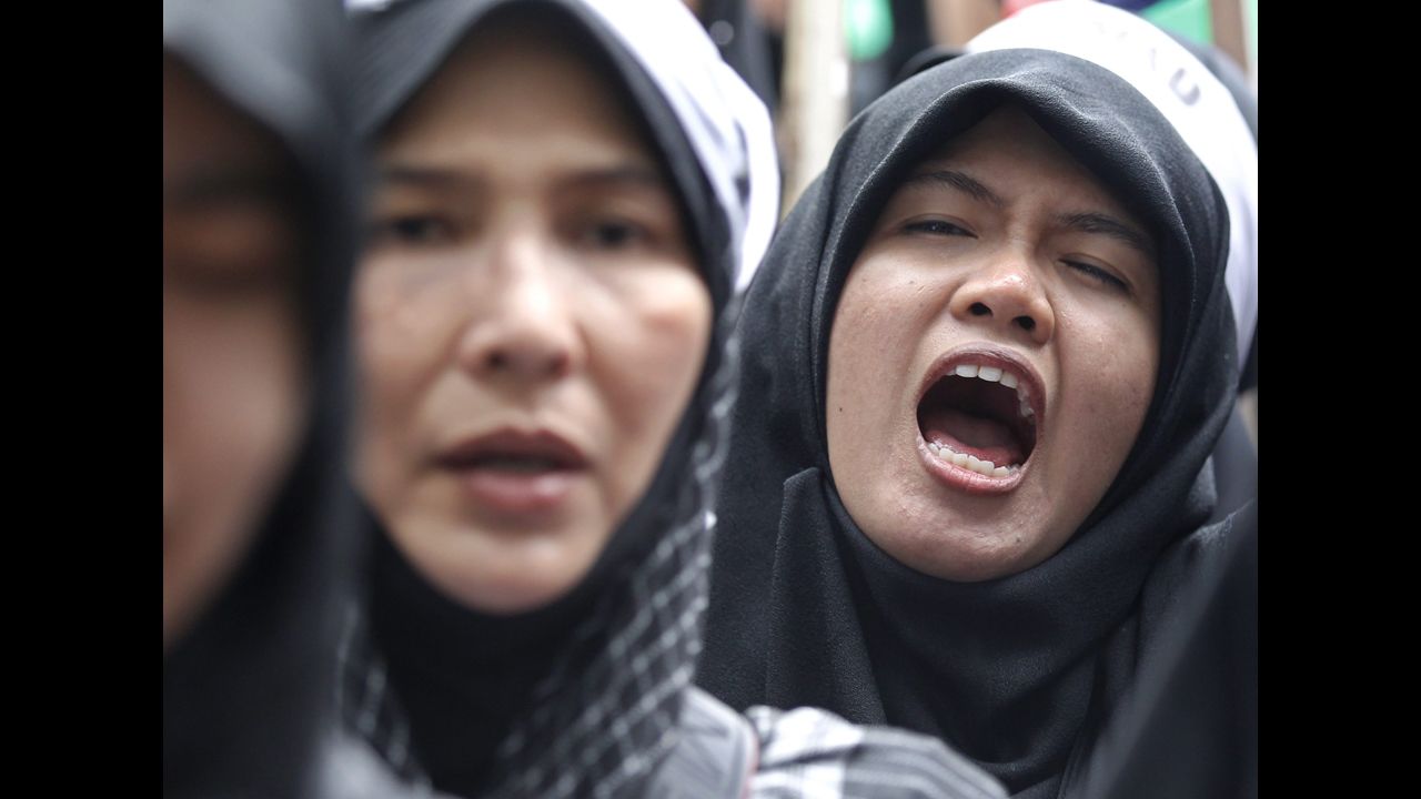 Thai Muslims shout slogans during a protest in Bangkok, Thailand, on Tuesday.