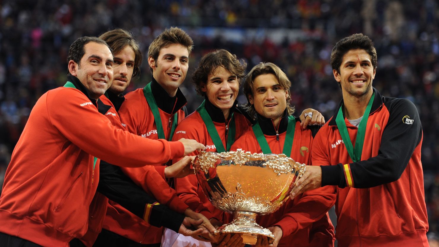 Team captain Albert Costa, Feliciano Lopez, Marcel Granollers, Rafael Nadal, David Ferrer and Fernando Verdasco celebrate.