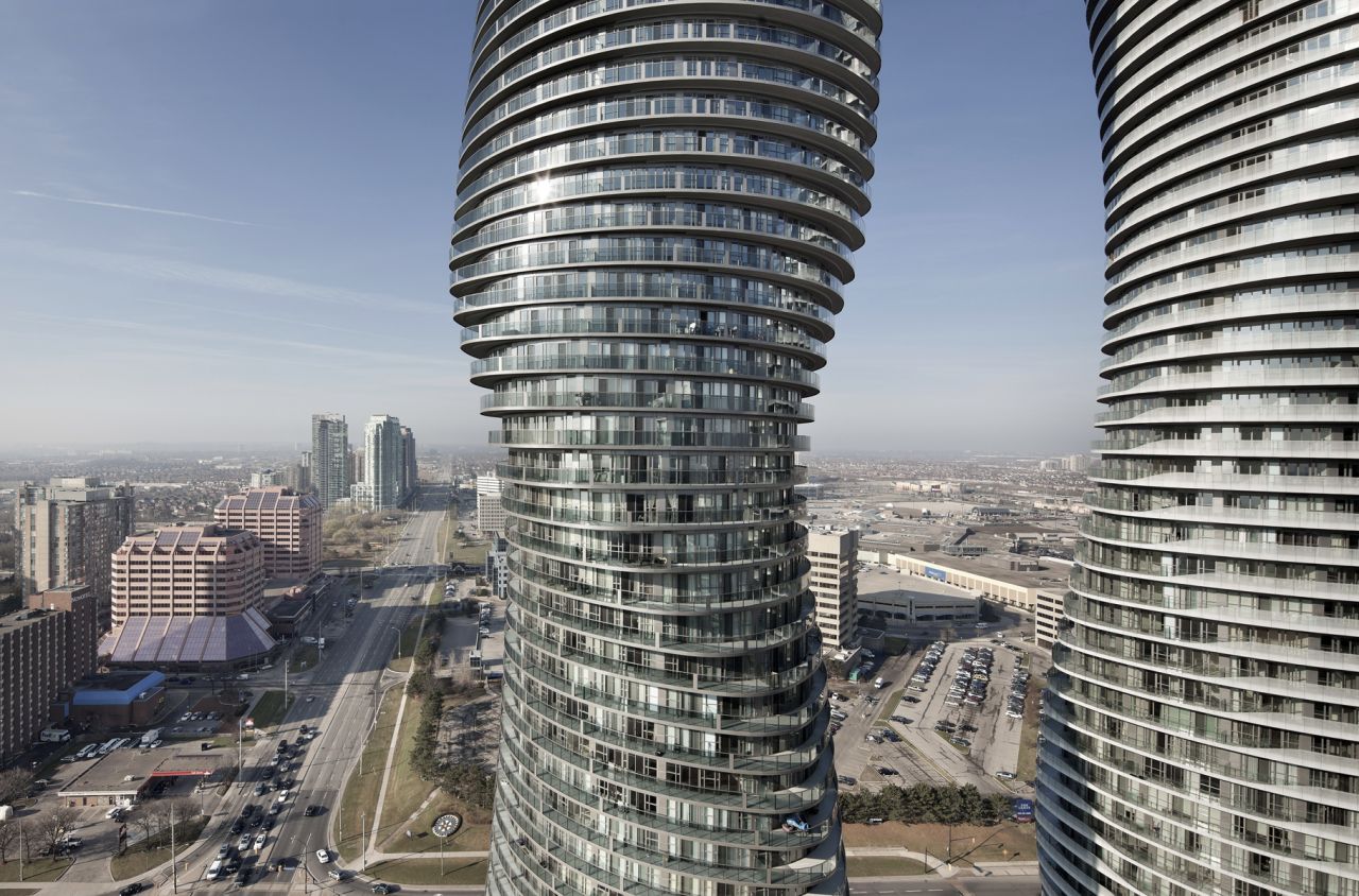 Beijing architect Ma Yansong designed the Absolute Towers that have enlivened the city of  Mississauga in Canada. A continual balcony spirals up the building's sinuous exterior, and every floor is different.